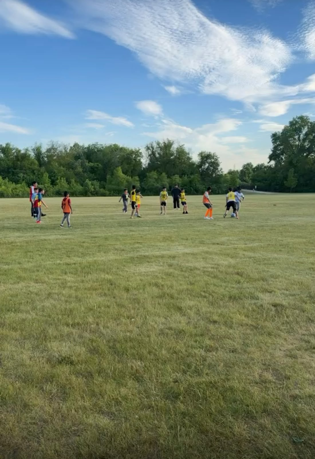 Small-group youth soccer coaching on the pitch at Oak Creek, Wisconsin